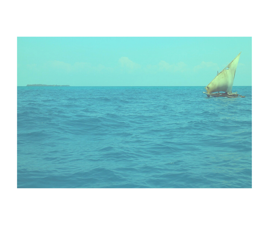 tattered ship floats alone